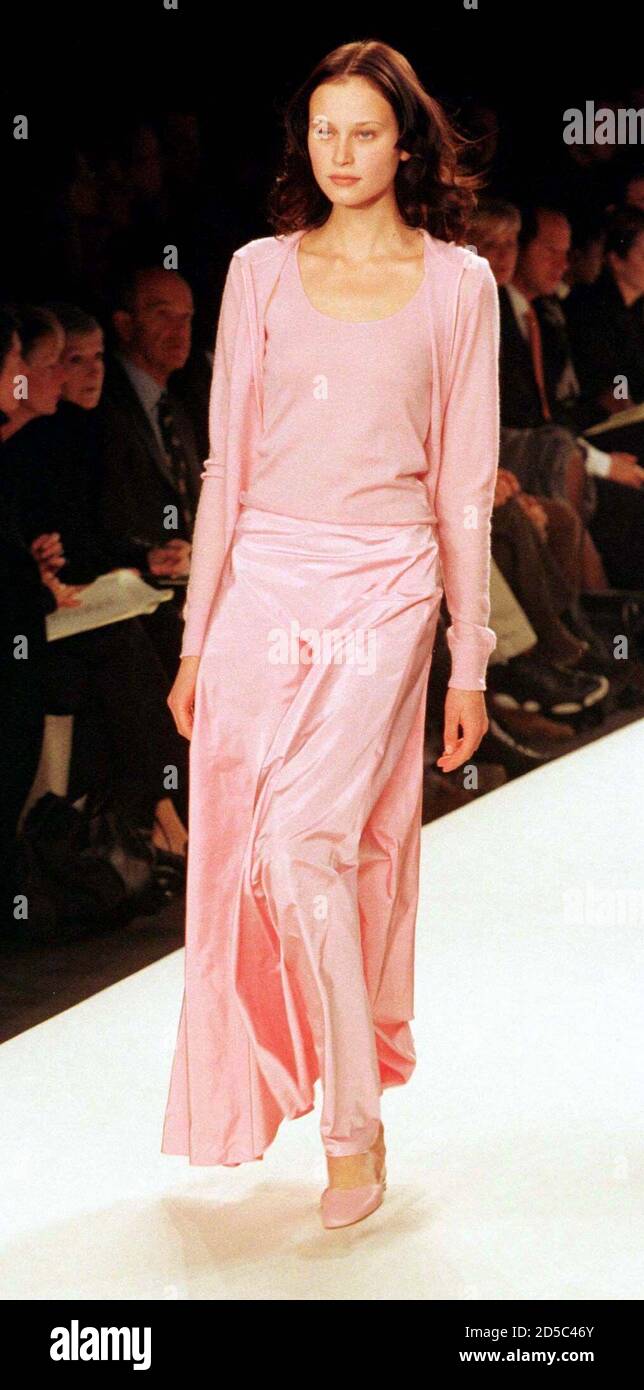 A model for designer Ralph Lauren wears a pink sweater during a showing of  the designer's Spring 1999 fashion collection in New York, November 4. The  Spring 1999 collections are showing in