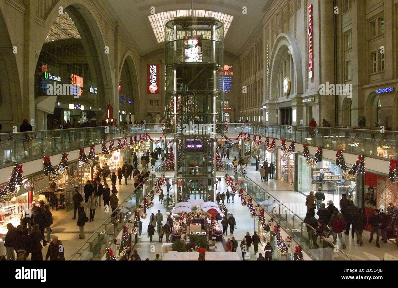 People shop at a shopping mall inside Leipzig's main station late December  2. The shopping center offers 140 shops, restaurants and boutiques. Despite  Germany's trading laws which close down shopping centers in