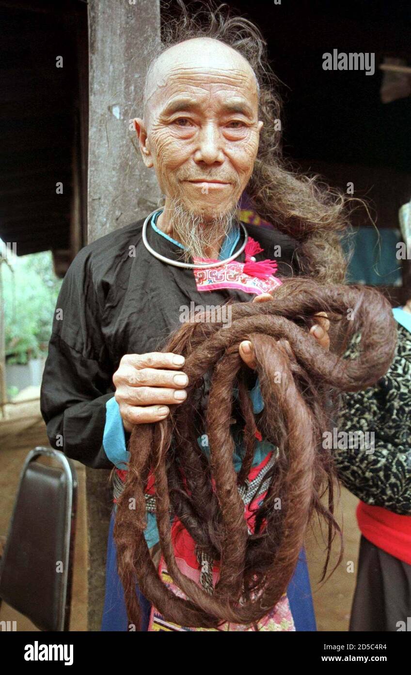 Lu Seng La, a 77-year-old Hmong hilltribe man, shows off his locks in  Chiang Mai in northern Thailand December 17. A museum in Thailand last week  awarded Hu with a certificate recognising
