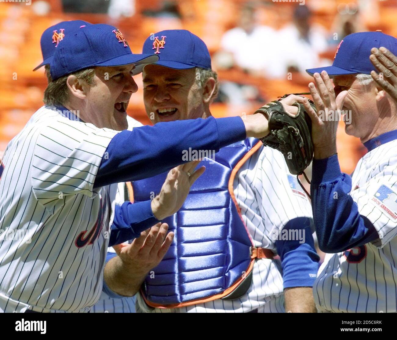 1969 New York Mets relief pitcher Tug McGraw (L) shouts "You Gotta