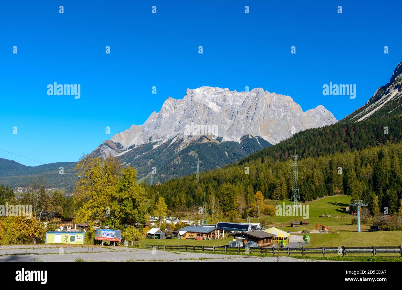 Zugspitze alp highest german  mountain in autumn (Bavaria, Germany). View from  Ehrwald, Tyrol, Austria Stock Photo