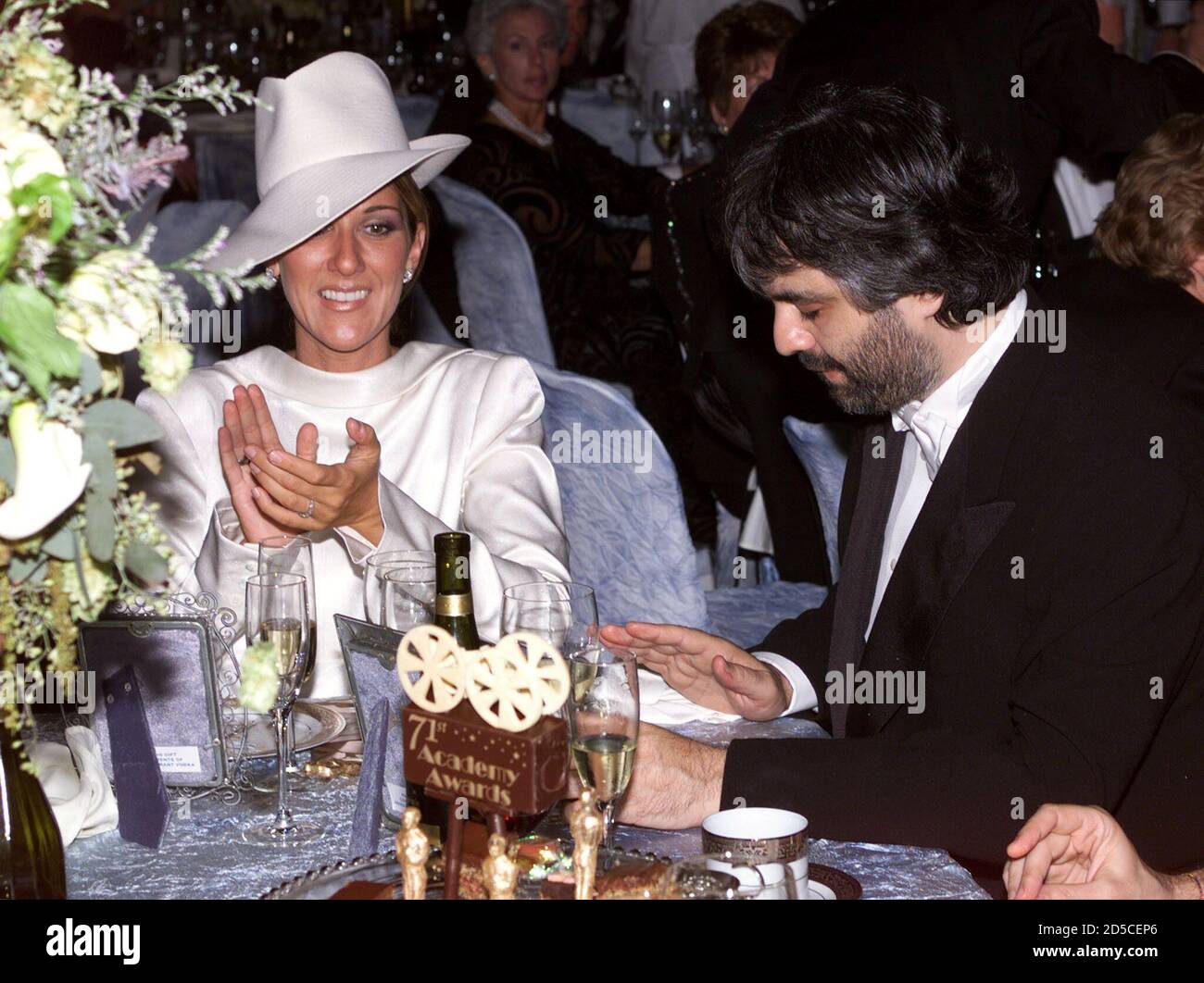 Singers Celine Dion and Italian Andrea Bocelli enjoy the music at the