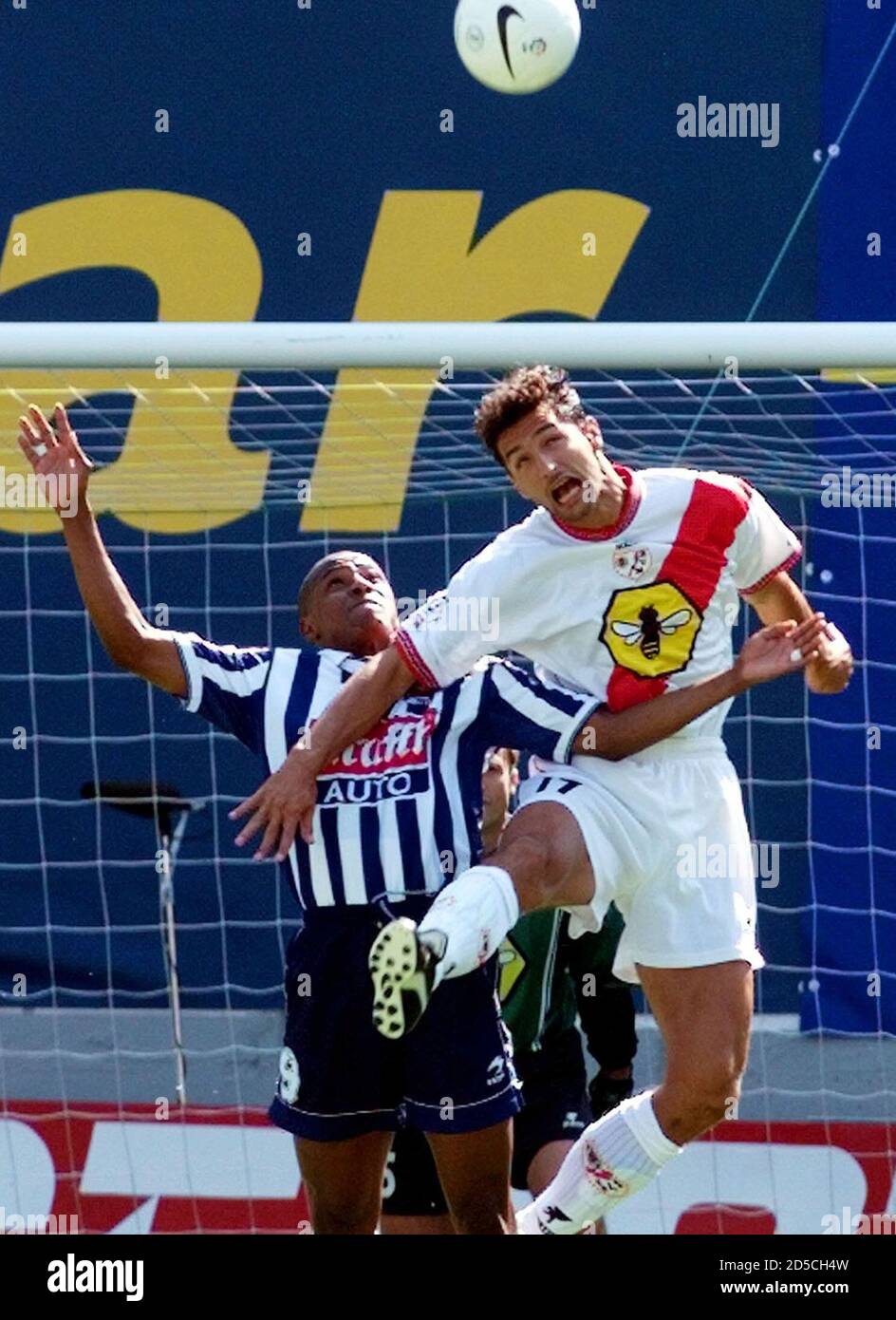 Rayo Vallecano's French defender Jean Francois Hernandez (R) and Real  Sociedad's Colombian striker Victor Bonilla fight for a high ball during  their First Division soccer match September 12. Rayo Vallecano won 2-1.