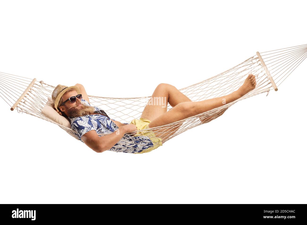 Bearded guy laying in a hammock swing isolated on white background Stock Photo