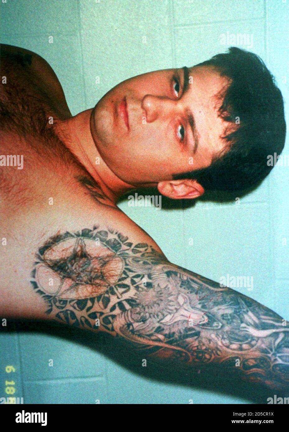 This exhibit, of John William 'Bill' King with tattoos, was entered into evidence February 17 in the capital murder trial against him. King, 24, is accused in the dragging death of James Byrd Jr. eight months ago in Jasper, Texas.  AAL/JDP Stock Photo