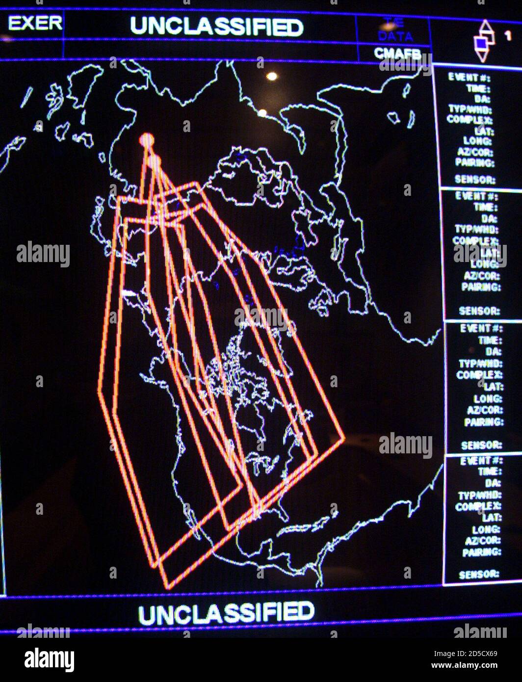 A computer screen in the NORAD (North American Aerospace Defense Command) center deep inside Cheyenne Mountain displays a simulated missile attack from China. Displayed on October 14 were five imaginary missiles launched from two sites in China, with their 'target fans' projecting where they might land. In this drill the missiles hit Seattle, Denver, Detroit, New York and Washington 32 to 36 minutes after launch.  RTW/HB Stock Photo
