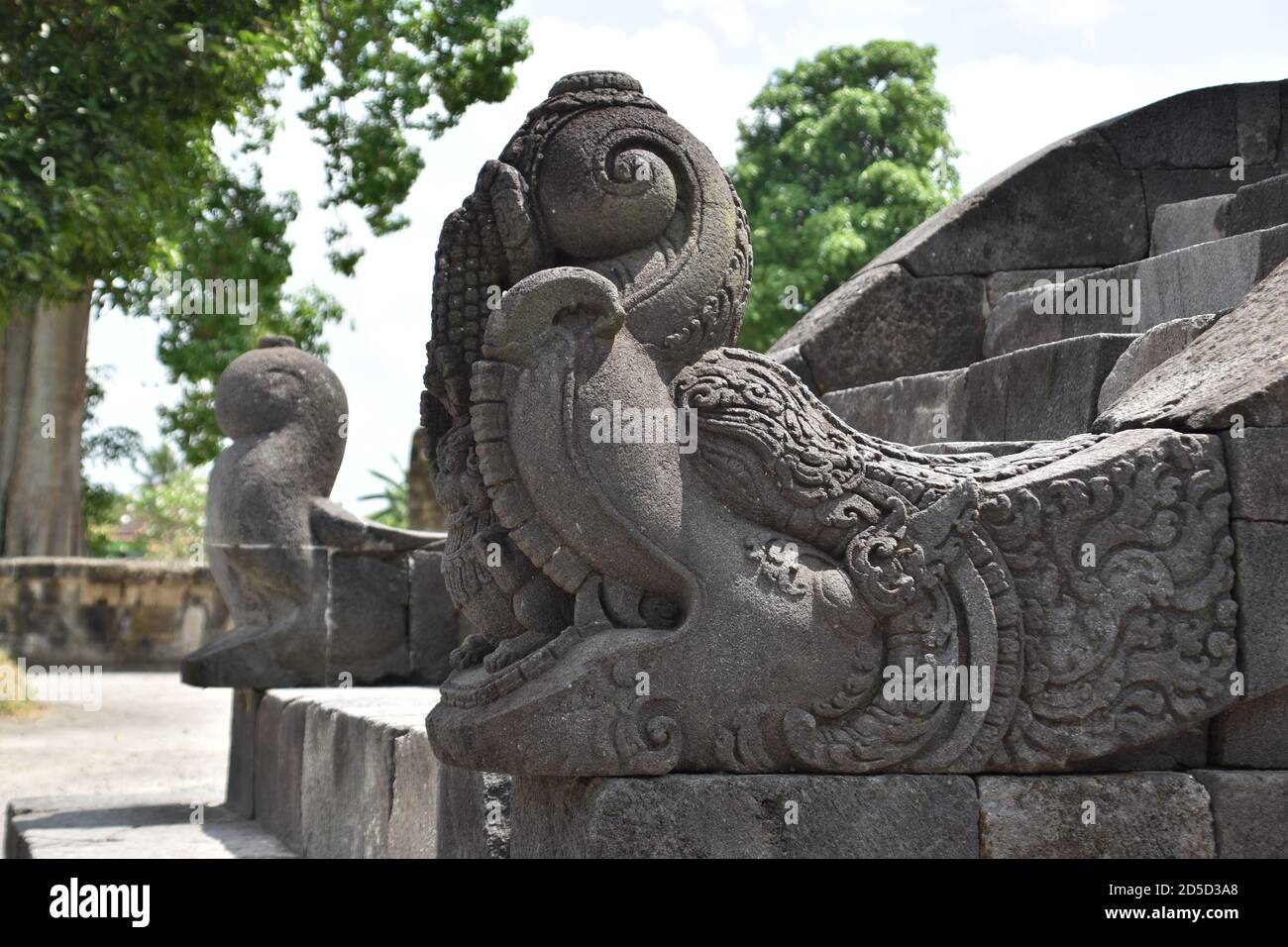 Makara statue on the steps of Sojiwan Temple, in Central Java, Indonesia Stock Photo
