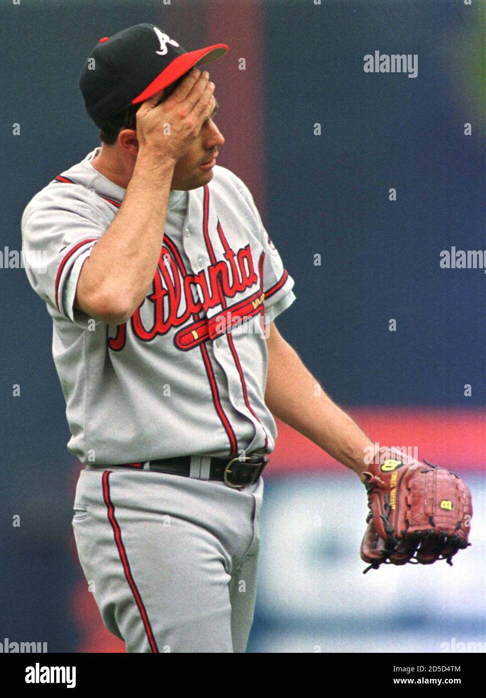 Atlanta Braves pitcher Greg Maddux reacts after giving up a FBI double to San Diego Padres' Quilvio Veras in the fifth inning of the May 9 game in San Diego. Maddux was roughed up by the Padres giving up six runs on five hits with two strikeouts and two walks in six innings. Maddux was also hit by a pitch from Padres pitcher Sterling Hitchcock, nearly setting off a fight.  JTL/JP Stock Photo