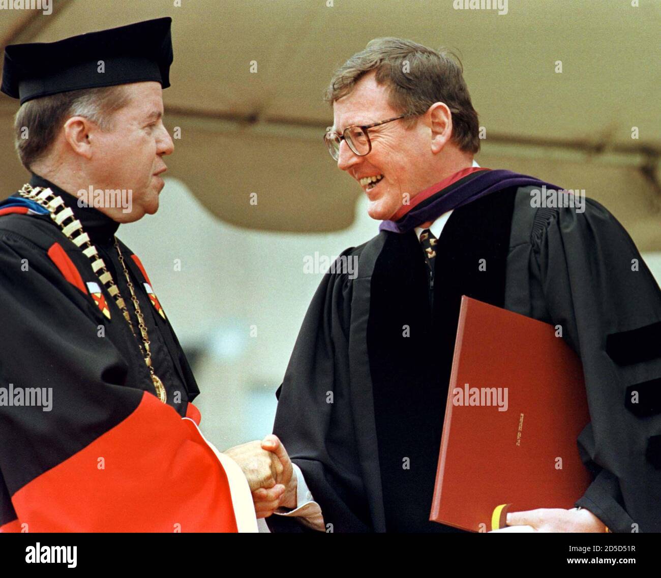 boston-college-president-rev-william-p-leahy-l-congratulates-david-trimble-first-minister-of-the-northern-ireland-assembly-and-1998-nobel-peace-prize-winner-after-awarding-trimble-with-an-honorary-doctor-of