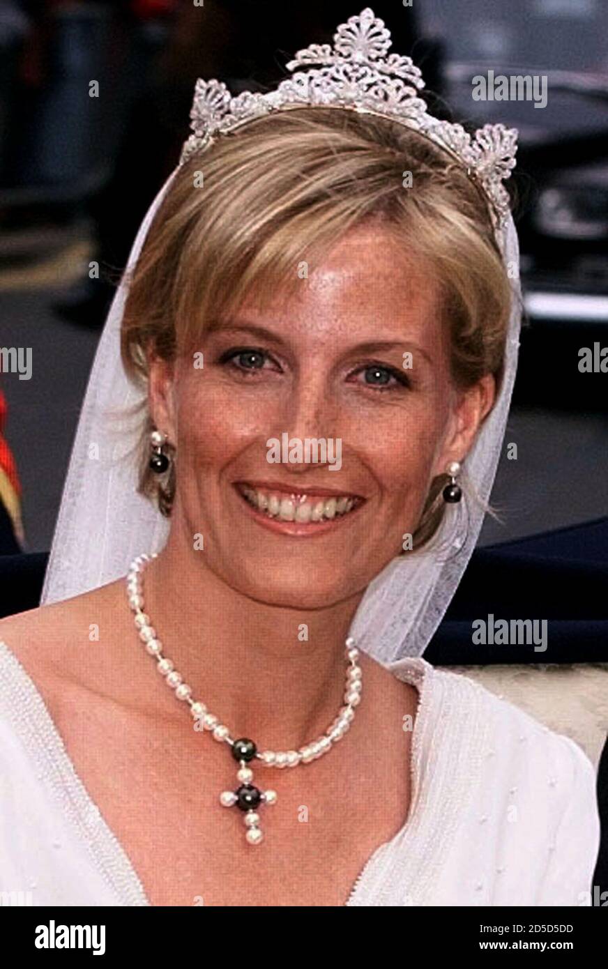 Sophie, Countess of Wessex, smiles from her carriage following her wedding  to Prince Edward in St Georges Chapel, Windsor Castle June 19. Queen  Elizabeth's youngest son and his bride toured the streets