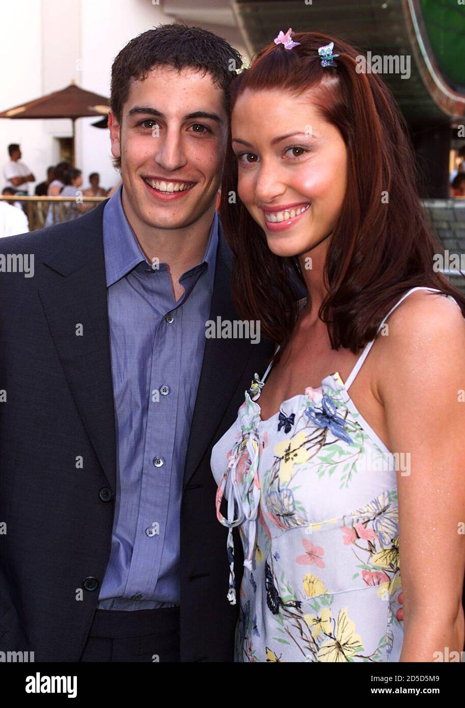 Actors Jason Biggs (L) and Shannon Elizabeth, two of the ensemble cast  members of the comedy film " American Pie" arrive for the film's premiere  July 7 in Los Angeles. The film