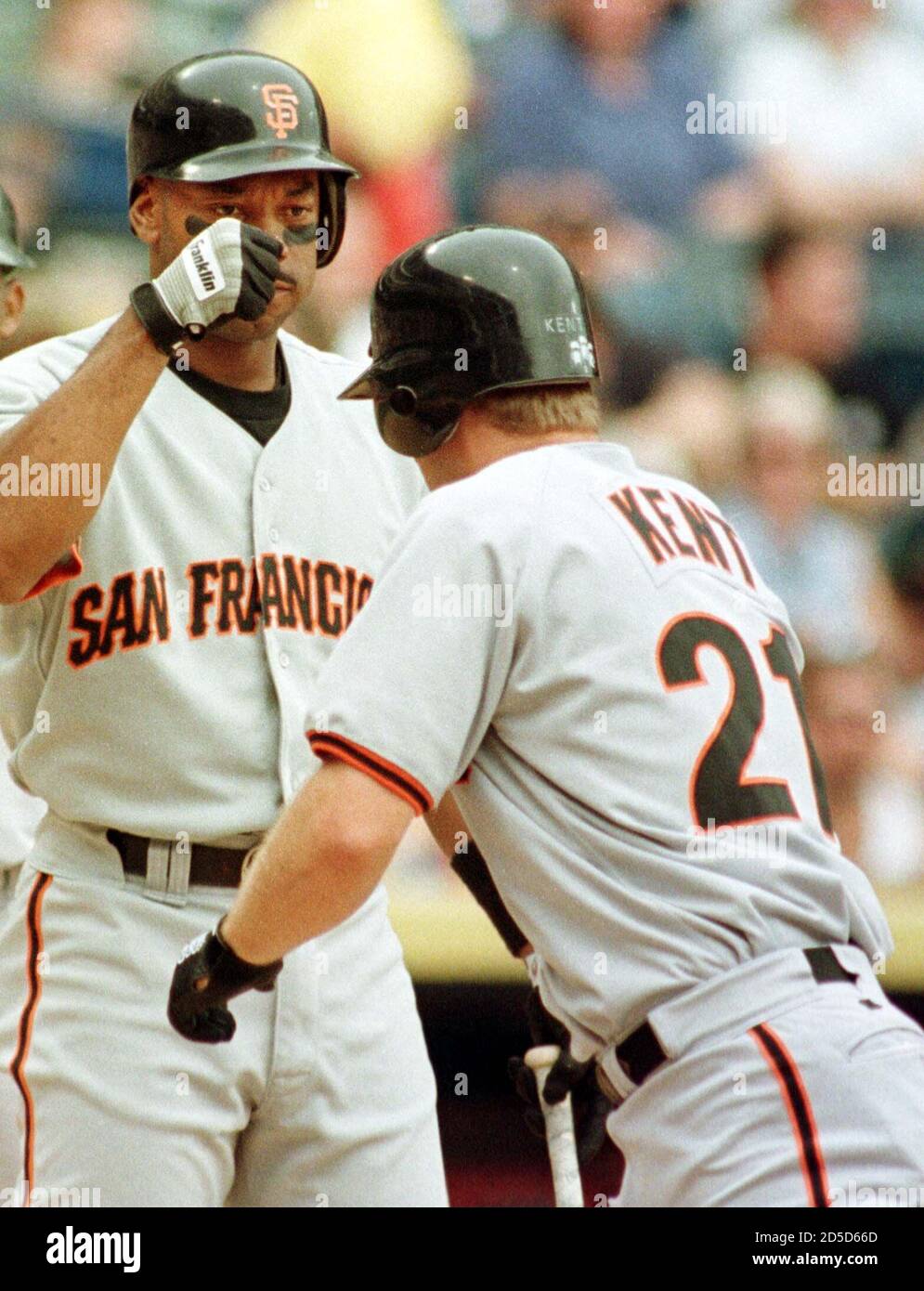 San Francisco Giants Hitter Jeff Kent Is Congratulated By On Deck Batter Ellis Burks After Hitting A Solo Home Run Off Milwaukee Brewers Pitcher Cal Elred In The First Inning At Milwaukee San Francisco Giants Hitter Jeff Kent Is Congratulated By On Deck Batter Ellis Burks After Hitting A Solo Home Run Off Milwaukee Brewers Pitcher Cal Elred In The First Inning At Milwaukee