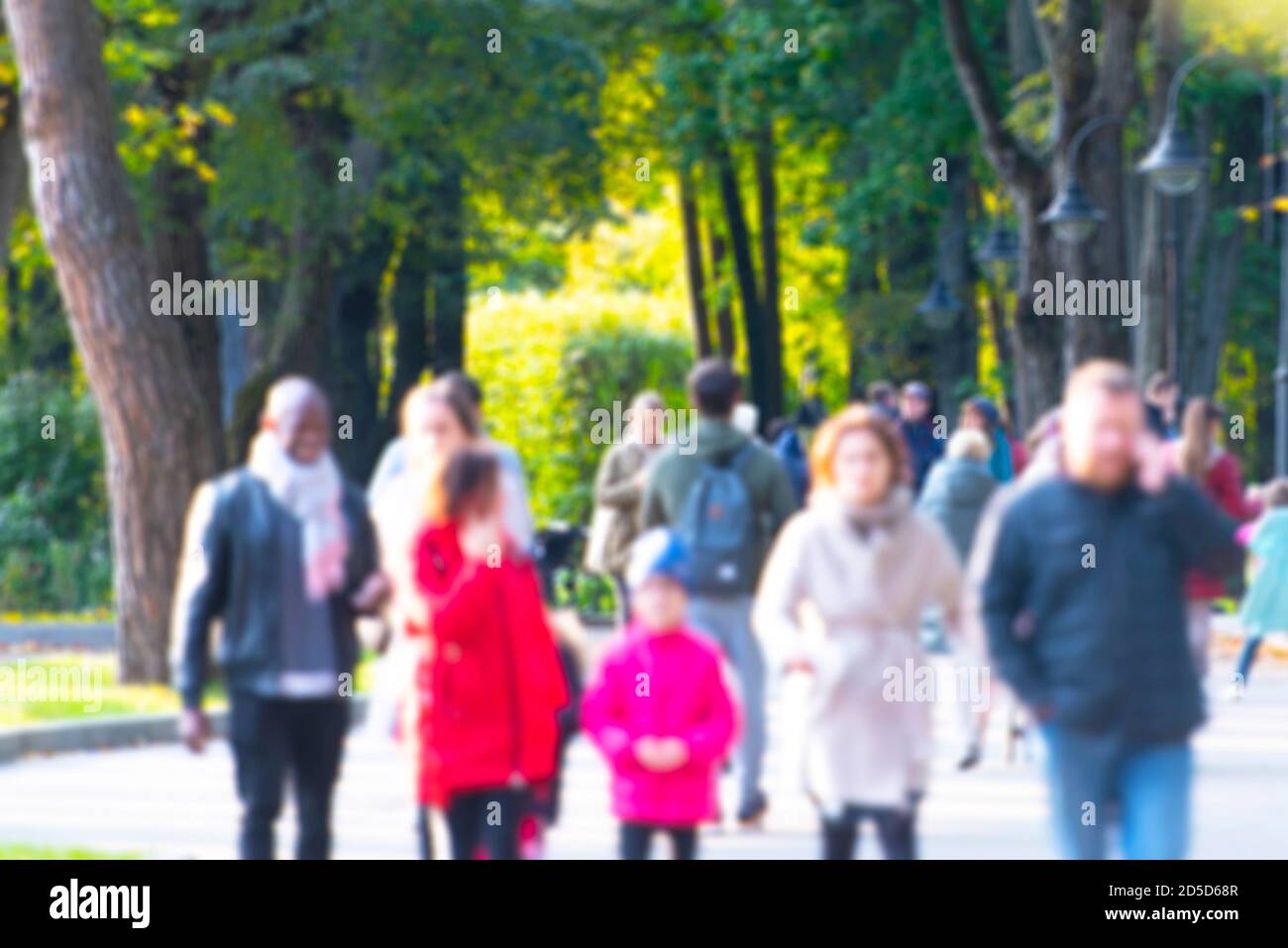 Person in focus in blurred crowd hi-res stock photography and images ...
