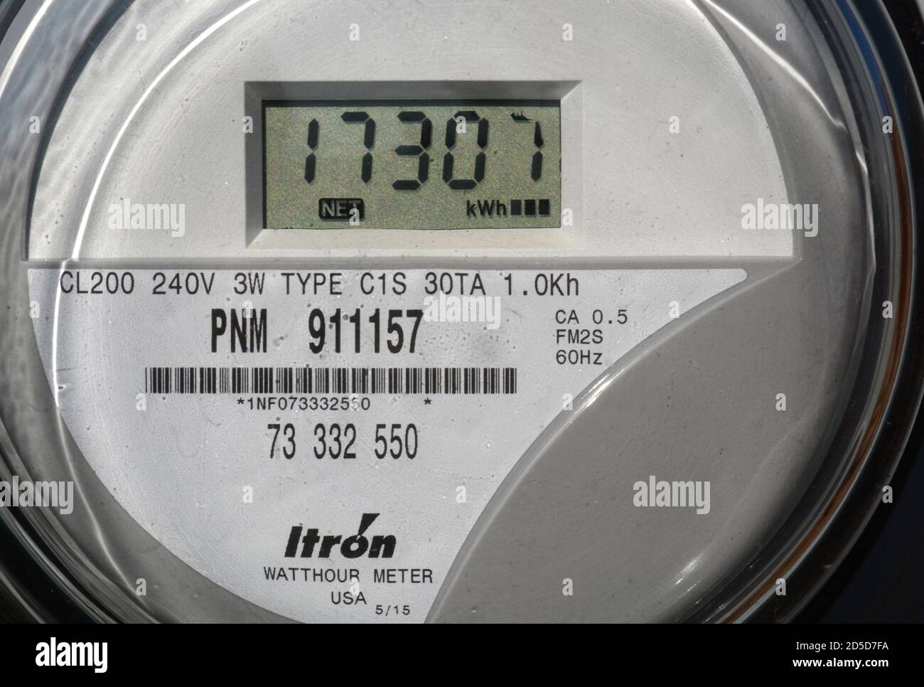 A Centron residential electric meter manufactured by Itron on a home in