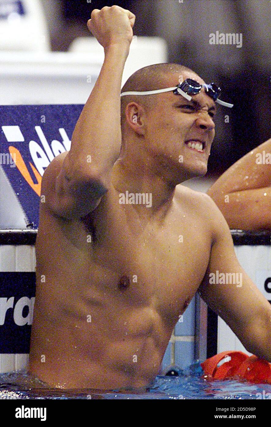 Australia's Geoff Huegill reacts after winning the Mens 100 metres  Butterfly final at the Australian Open Swimming Championships and Olympic  selection trials at the International Aquatic Centre at Sydney's Homebush  Bay May