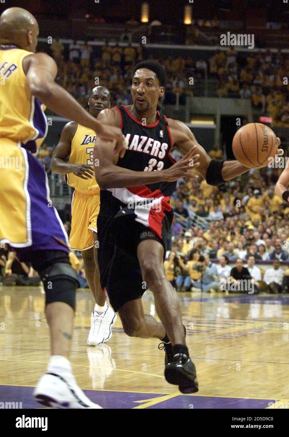 Portland Trail Blazers' Scottie Pippen (R) drives to the basket as Los  Angeles Lakers' Ron Harper guards in the first quarter during Game 7 of the  NBA Western Conference Finals in Los