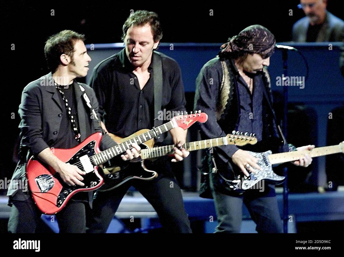 Musician Bruce Springsteen (C) performs at Madison Square Garden with members of his EStreet