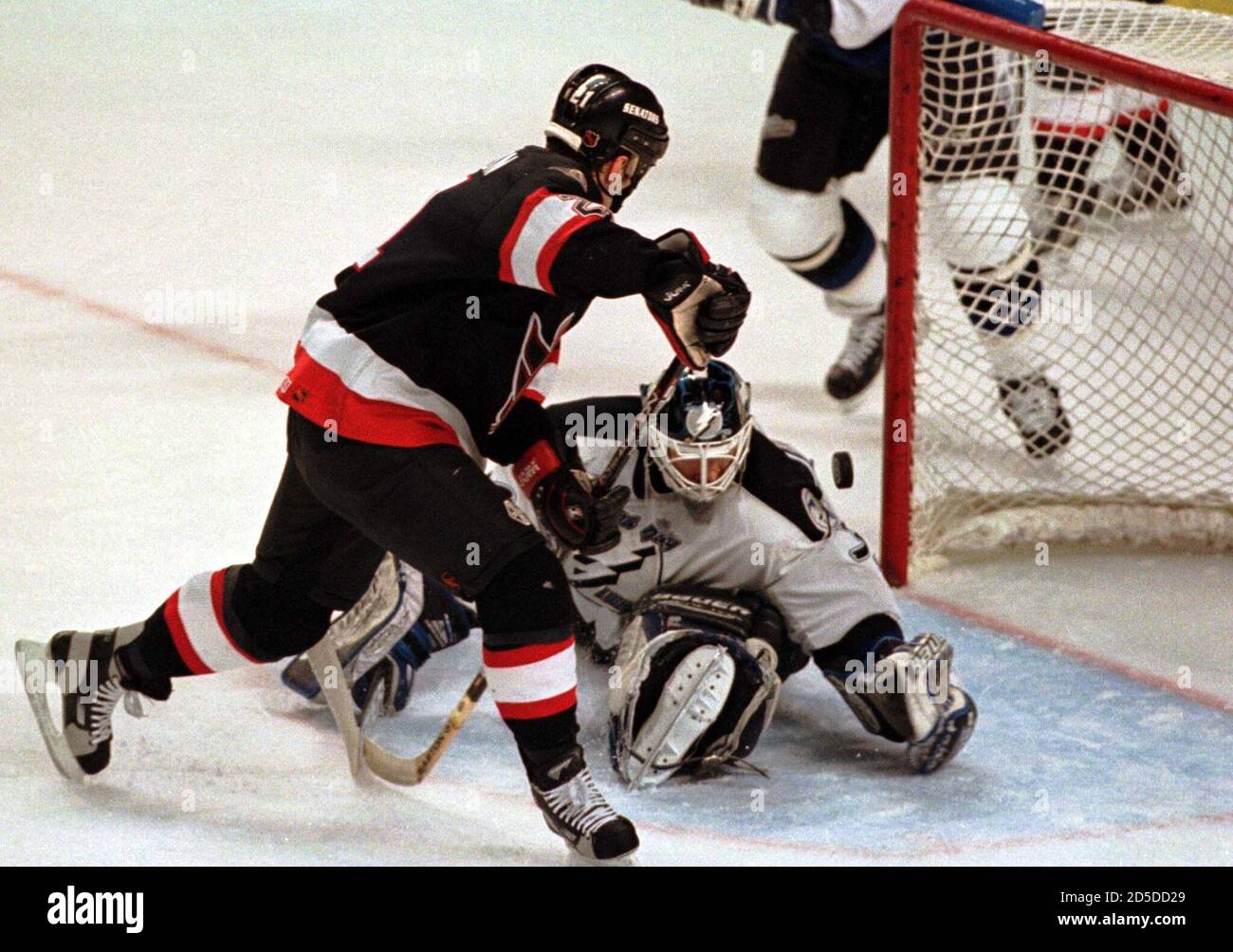 Tampa Bay Lightning goalie Corey Schwab can't stop Ottawa Senators left