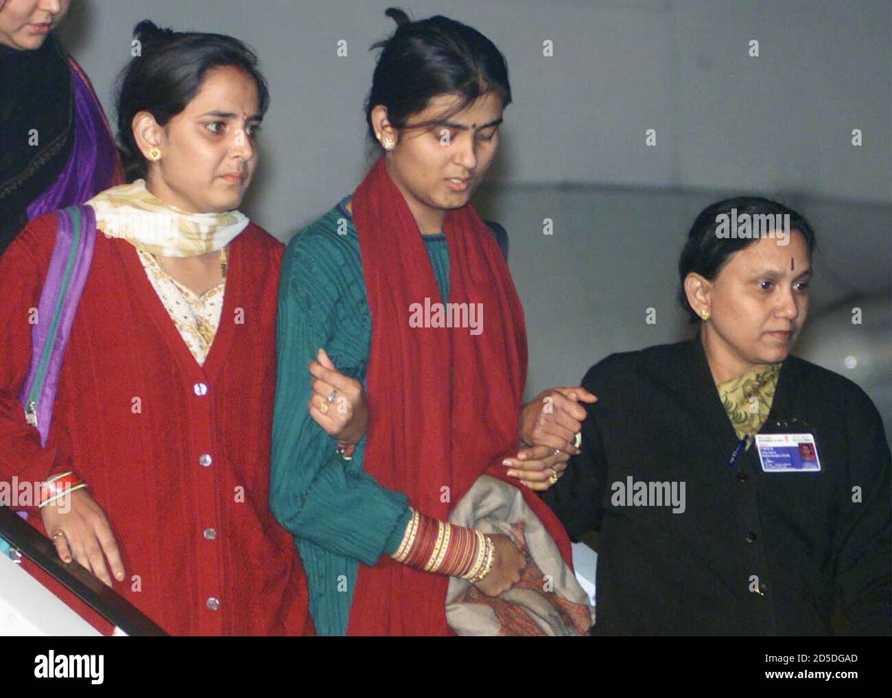 India Couple Airport High Resolution Stock Photography And Images Alamy Now scram you evil red haired home wrecker! https www alamy com rachna katyal wife of rupin katyal who was killed by the hijackers is helped on arrival at new delhi airport by a fellow hostage and an airline official december 31 rupin was killed by the hijackers on december 24 the couple were returning from their honeymoon in nepal more than 150 hostages were freed earlier in the day from the hijacked plane in southern afghanistan after the indian government released three islamic militants from prison smdl image381999589 html