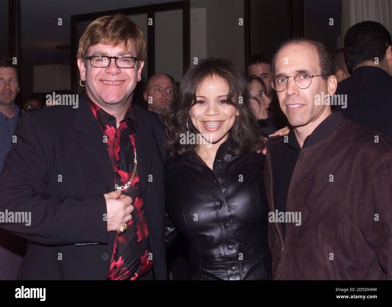 Dreamworks Studios Partner Jeffrey Katzenberg R Poses With Songwriter Sir Elton John And Actress Rosie Perez Voice Talent At A Special Vip Screening Of The New Animated Film The Road To