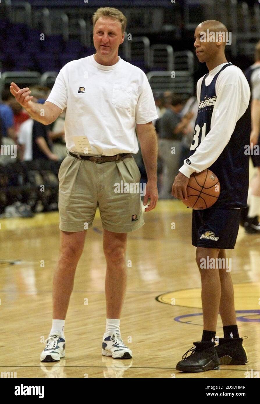 Indiana Pacers head coach Larry Bird (L) and guard Reggie Miller talk  during the team shoot-around at the Staples Center in Los Angeles, June 8.  The Pacers lost to the Lakers 104-87