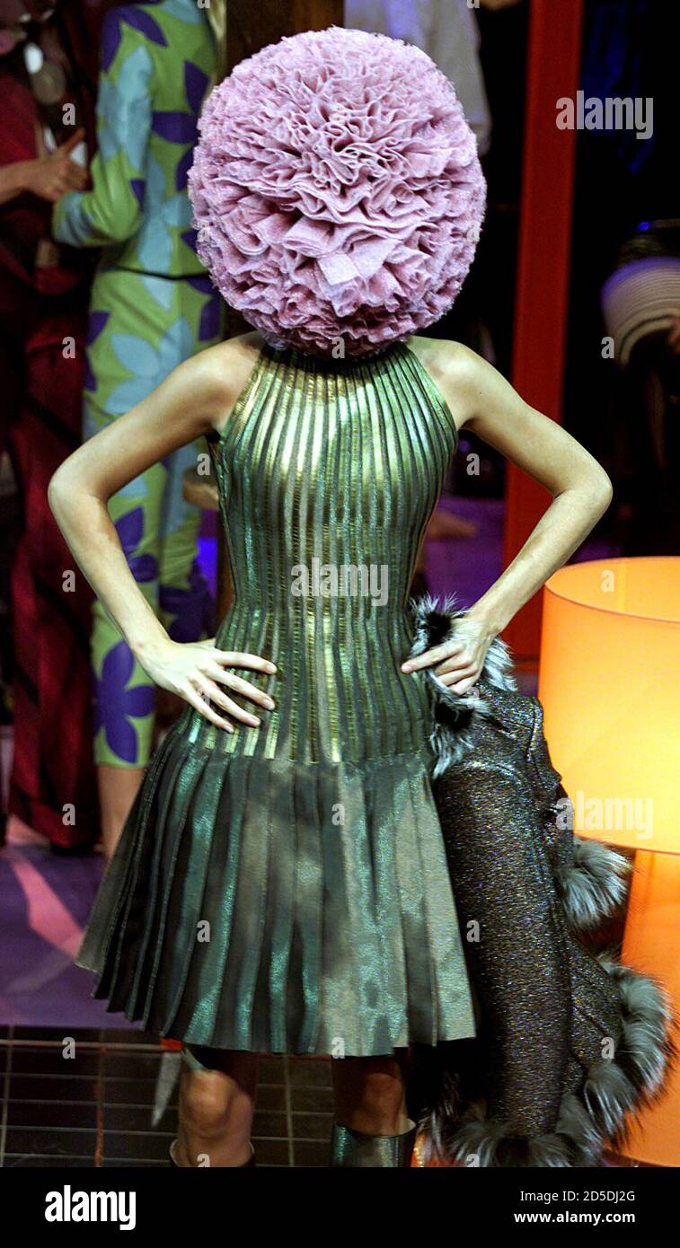 GIVENCHY'S FALL-WINTER 2000-2001 HAUTE COUTURE COLLECTION DESIGNED BY  BRITAIN'S DESIGNER ALEXANDER MCQUEEN. A model presents this creation July 9  as part of the Fall-Winter 2000-2001 Haute Couture fashion collection  designed by British