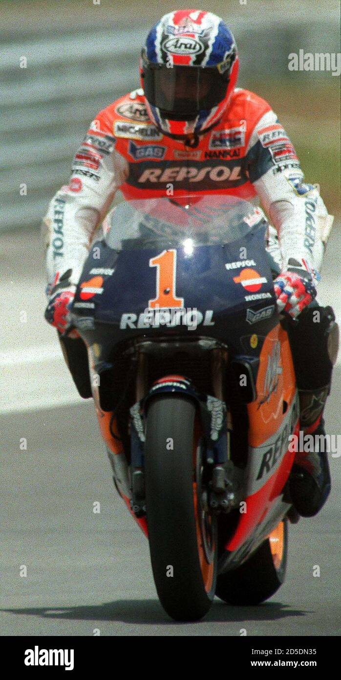 World number one 500cc motorcycle rider Michael Doohan from Australia tests  his Honda around Malaysia's new Sepang F1 Circuit near Kuala Lumpur March  11. Doohan and other world class riders are in