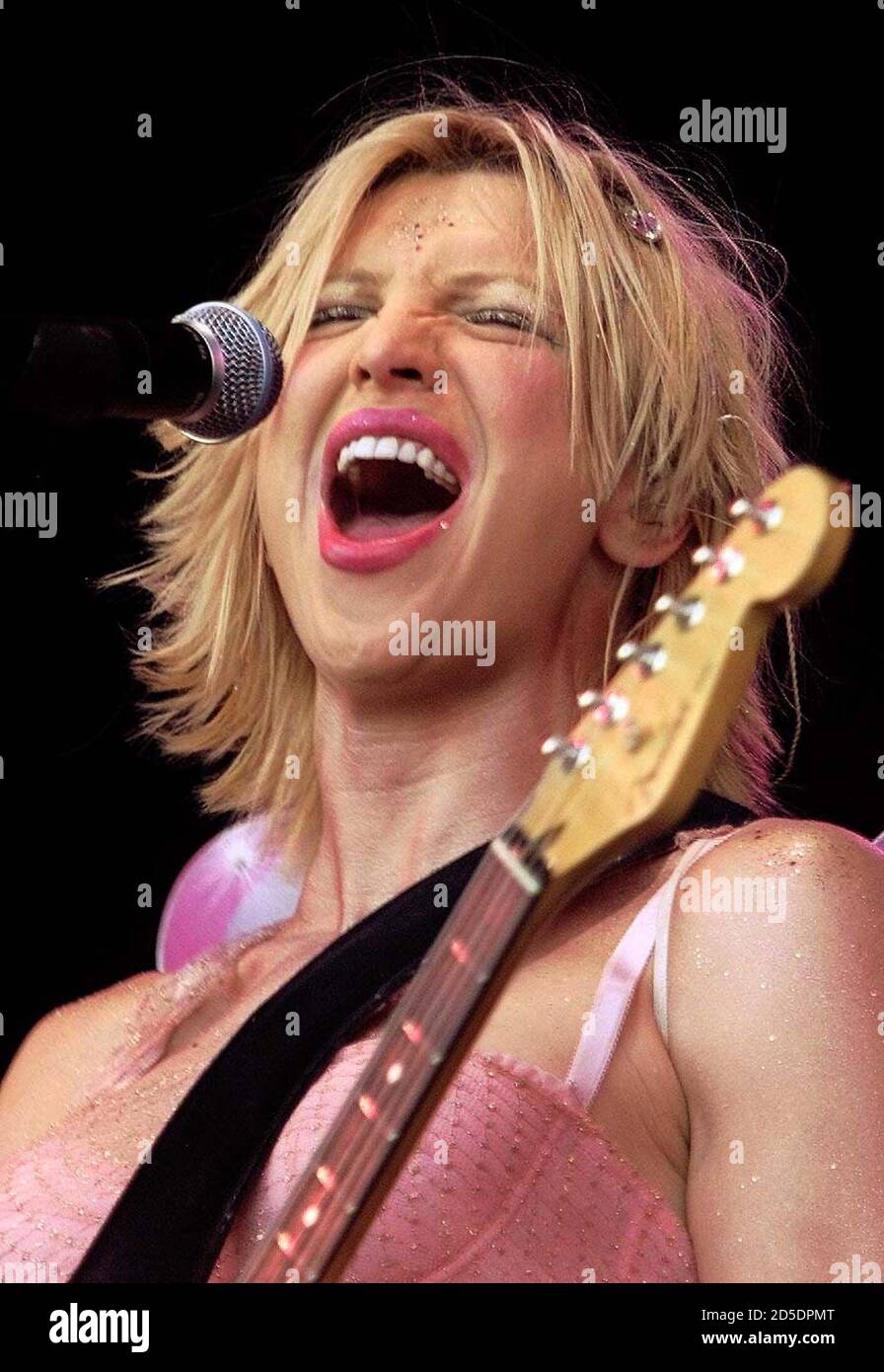 Courtney Love, the lead singer of the band Hole, performs on stage in the  sunshine at Glastonbury, June 25. The Glastonbury festival is the largest  of its kind in Europe with head
