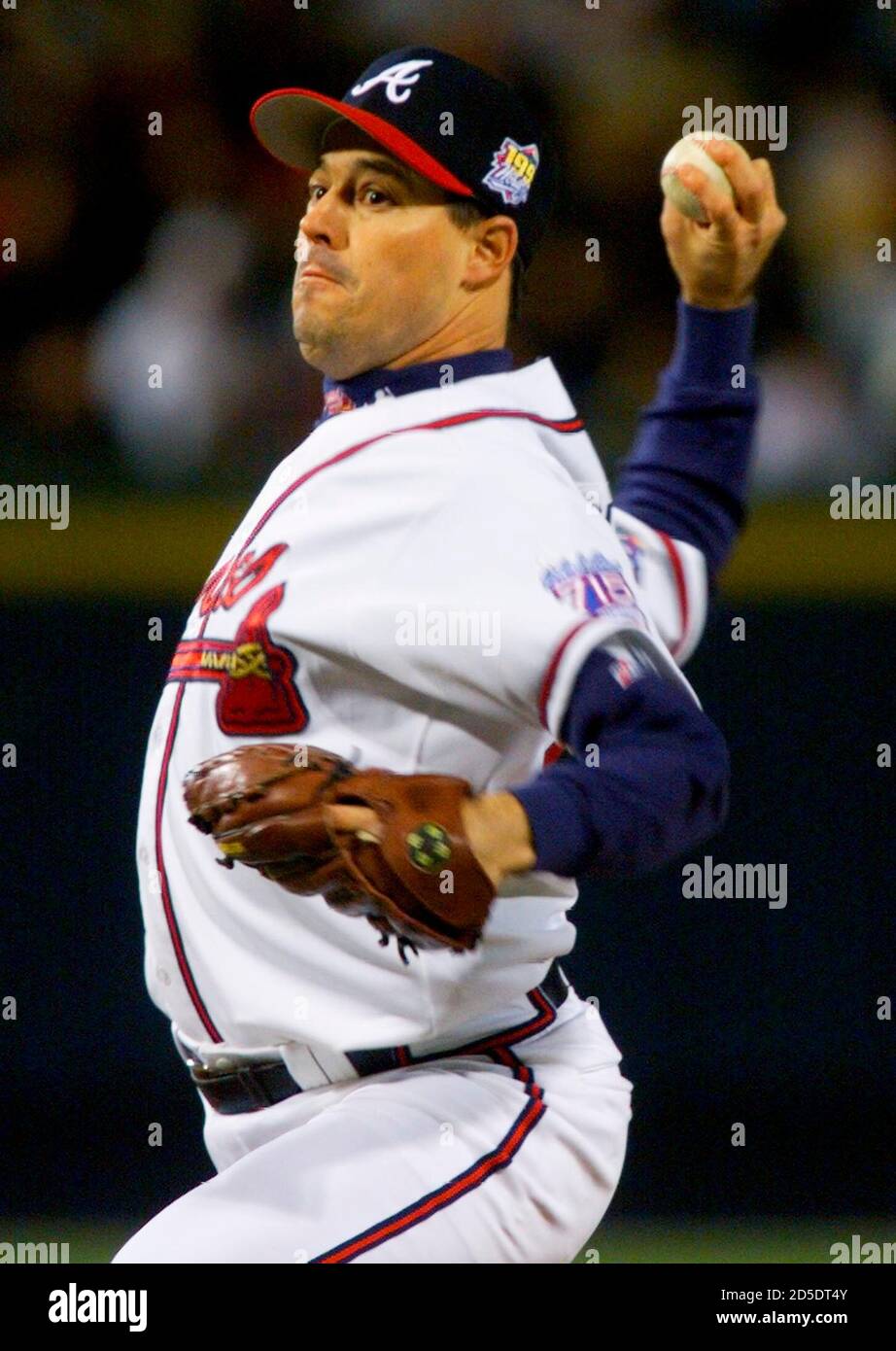 Atlanta Braves pitcher Greg Maddux delivers a pitch in the first inning in  Game 1 of the World Series against the New York Yankees October 23. GMH  Stock Photo - Alamy