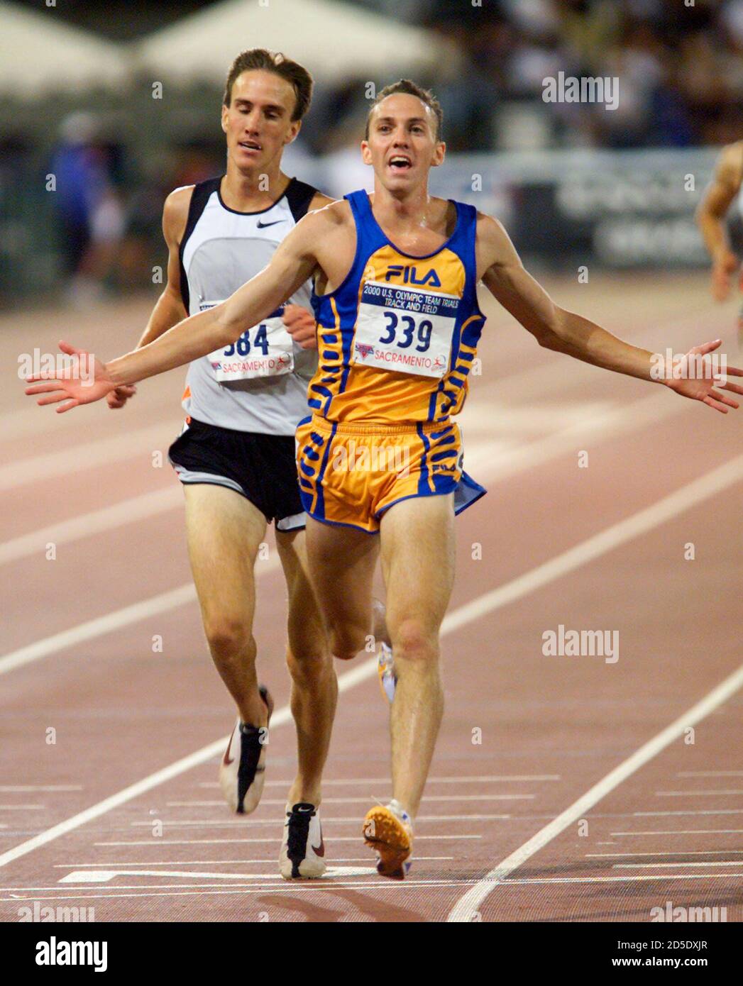 Adam Goucher(R) edges out Brad Hauser at the finish line to win the men's  5000m final at the U.S. Olympic Track and Field Trials in Sacramento July  21. Goucher won the race