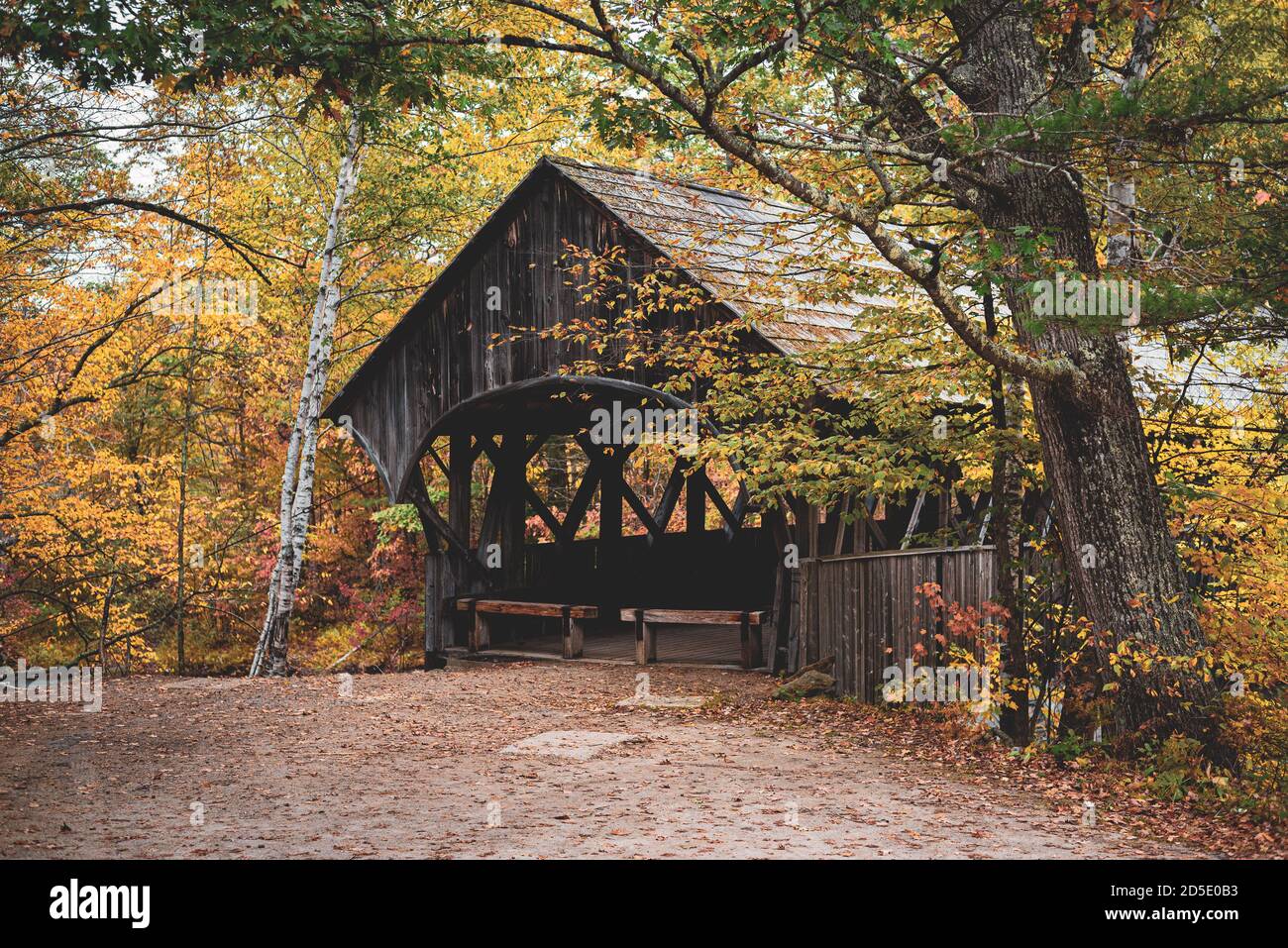 Autumn color and the Sunday River Covered Bridge, in Newry, Maine Stock Photo