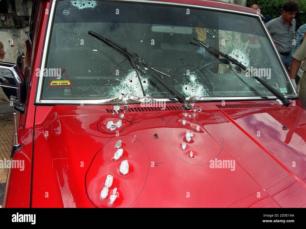 The bullet-ridden vehicle of Paraguayan Vice President Luis Argana remains  at the scene in the center of Asuncion where he was attacked by  unidentified gunmen early March 23. Argana was pronounced dead