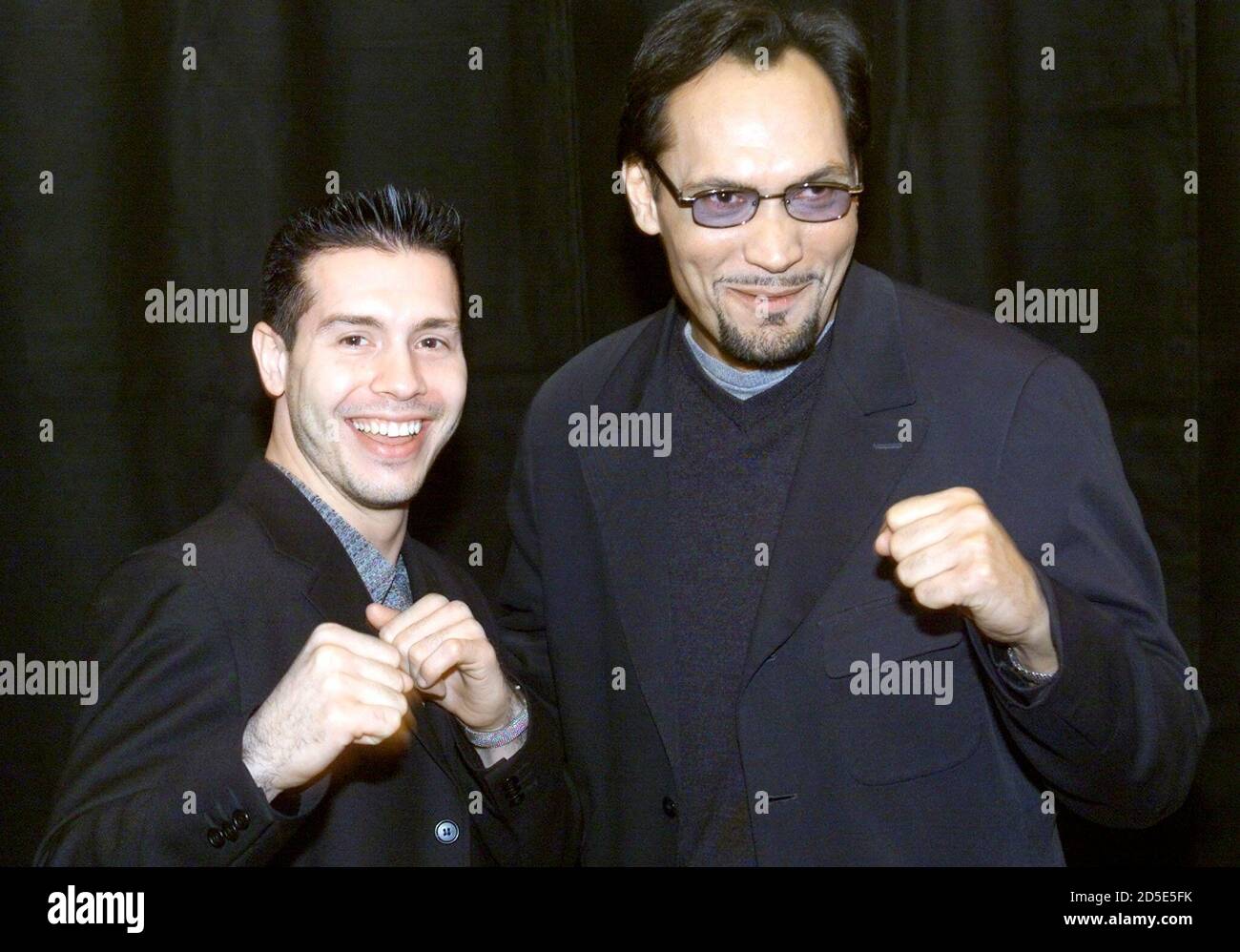 Actors Jon Seda and Jimmy Smits pose in an arrival line for a New Line Cinema luncheon at  the ShoWest 2000 convention March 7 in Las Vegas. The actors star in the upcoming boxing movie 'Price of Glory'. ShoWest is an annual convention and trade show for movie theater owners. Stock Photo