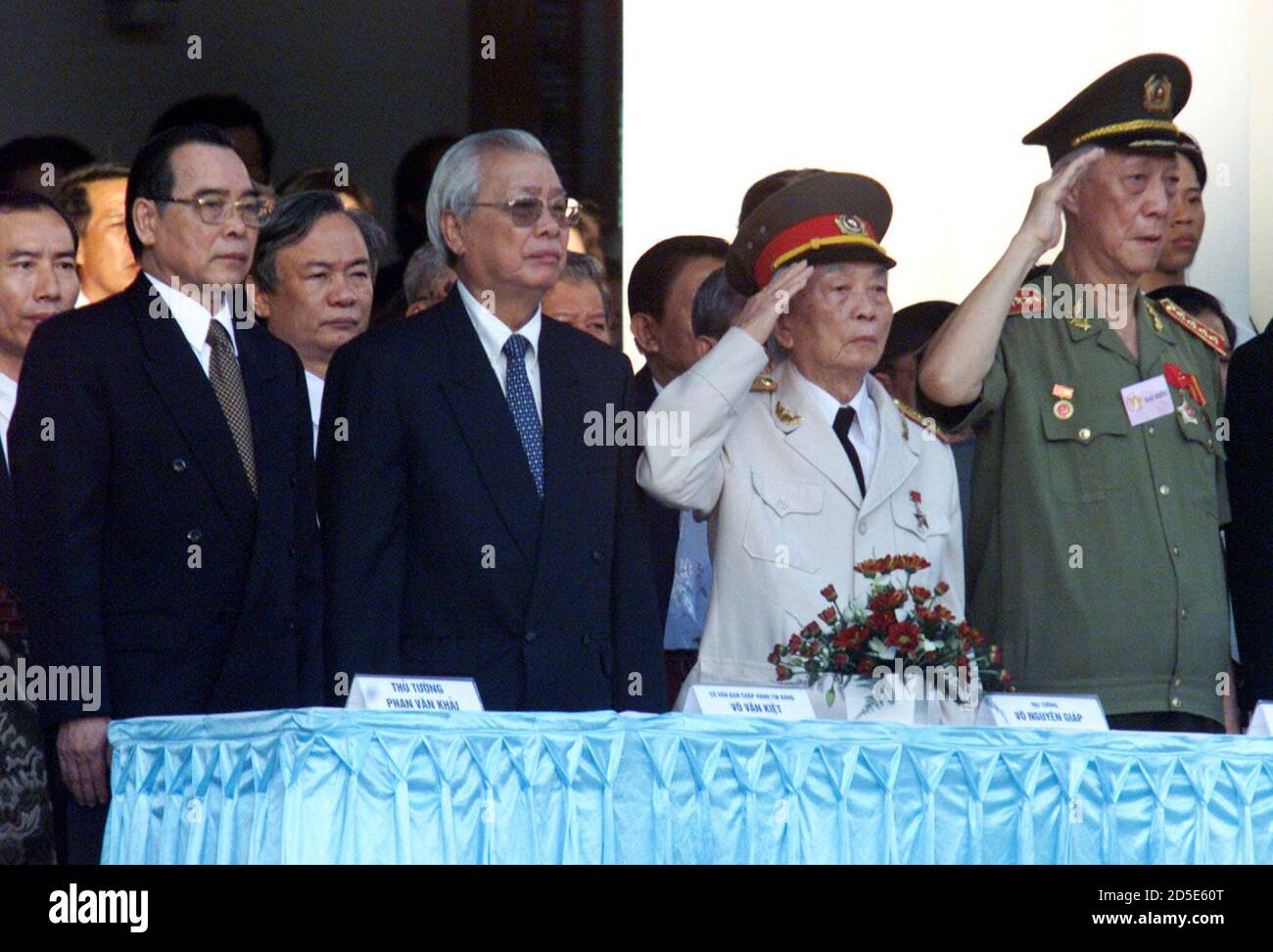 Vietnamese leaders (L-R) Prime Minister Phan Van Khai, former Prime  Minister Vo Van Kiet, Vietnam War architect General Vo Nguyen Giap, and  former Interior Minister Mai Chi Tho attend a parade commemorating