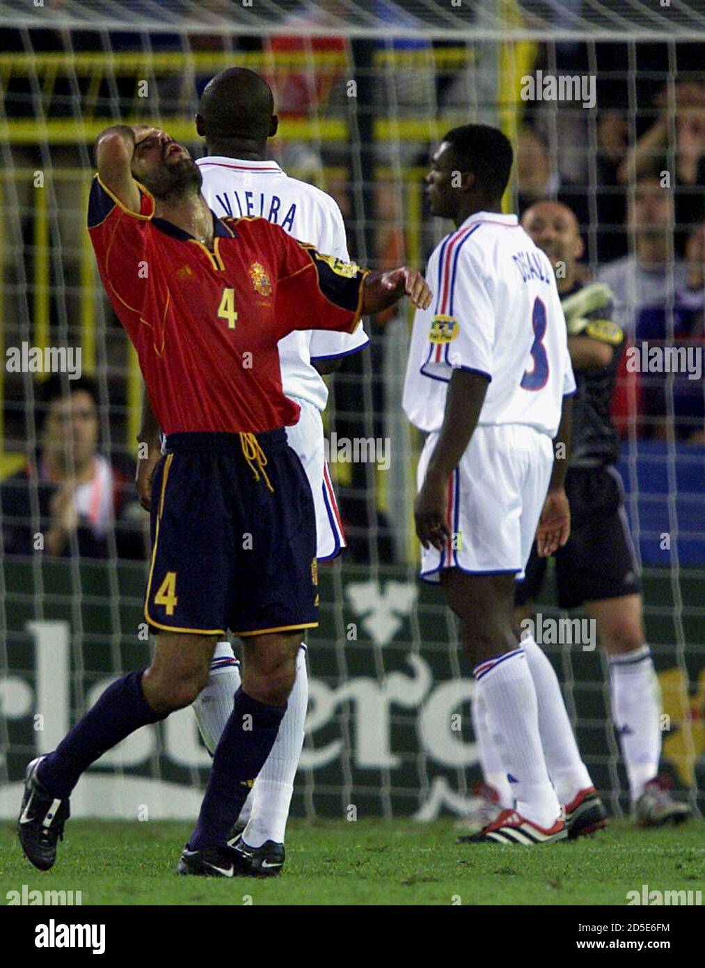 Spain S Josep Guardiola L Reacts After Missing A Chance As French Players Patrick Vieira L Rear Marcel Desailly R And Goal Keeper Fabien Bartherz R Rear Look On During Their European Championship