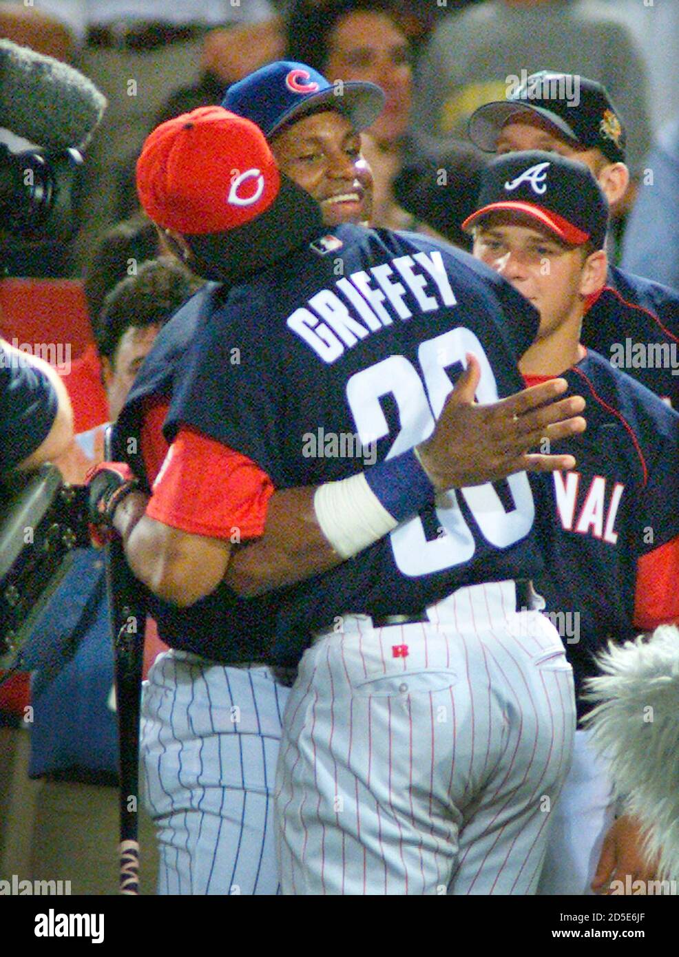 National League all-star Sammy Sosa (R) from the Chicago Cubs hugs Ken  Griffey Jr. after he won the annual Home Run Derby at the All-Star Game  July 10. Sosa defeated Griffey who
