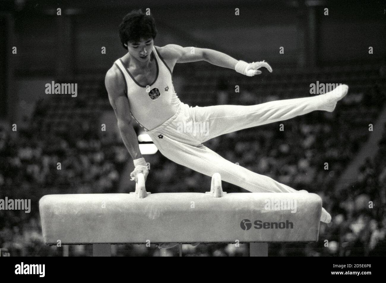 Lam Wai Kin of Hong Kong performs his routine during the pommel horse event of the men's team competition September 21, 1986 during the Asian Games in Seoul. SCANNED FROM NEGATIVE. REUTERS/Shunsuke Akatsuka  GDB/CMC/PN Stock Photo