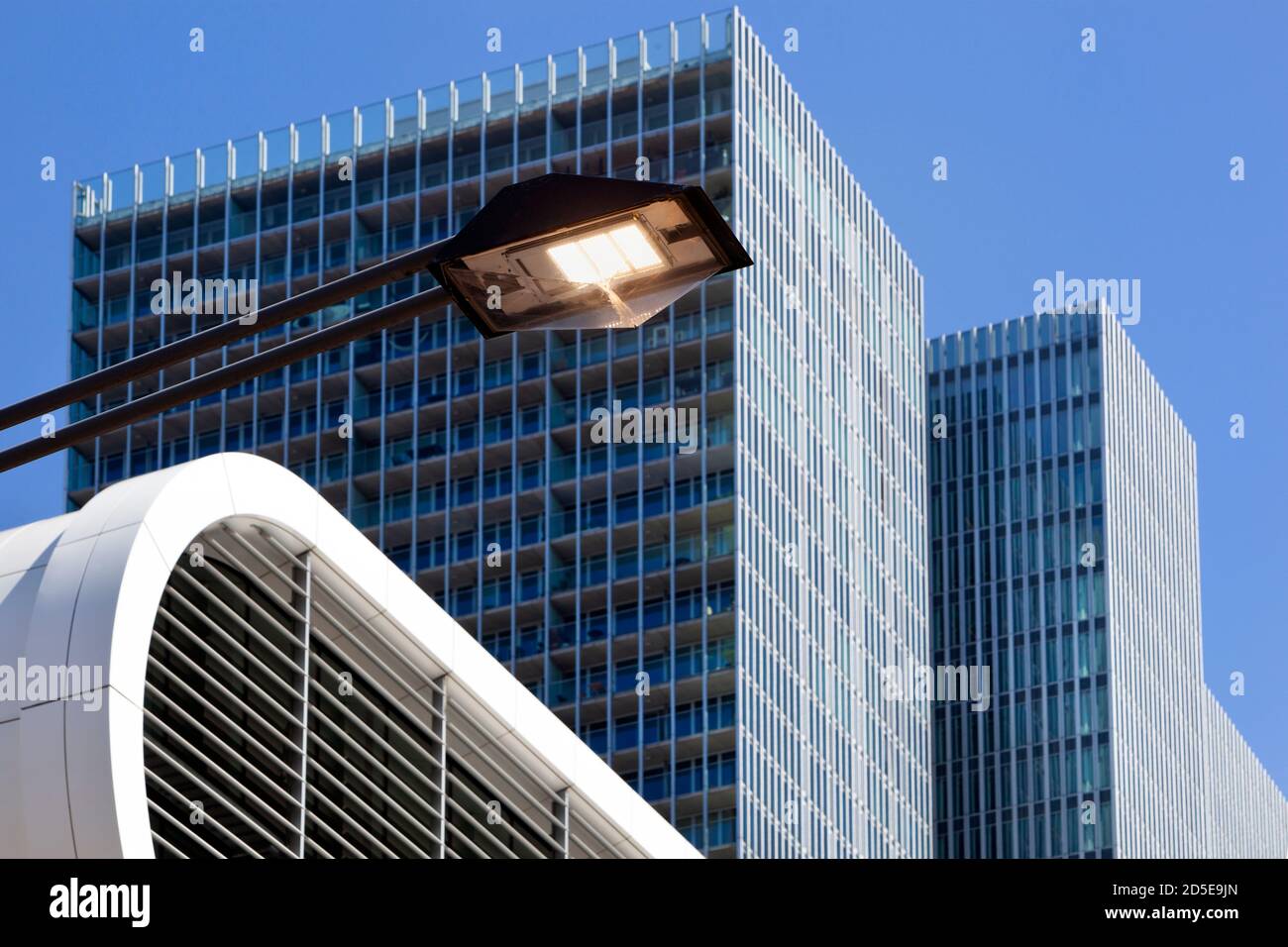 LED streetlight with modern buildings in the background in Rotterdam in the the Netherlands Stock Photo