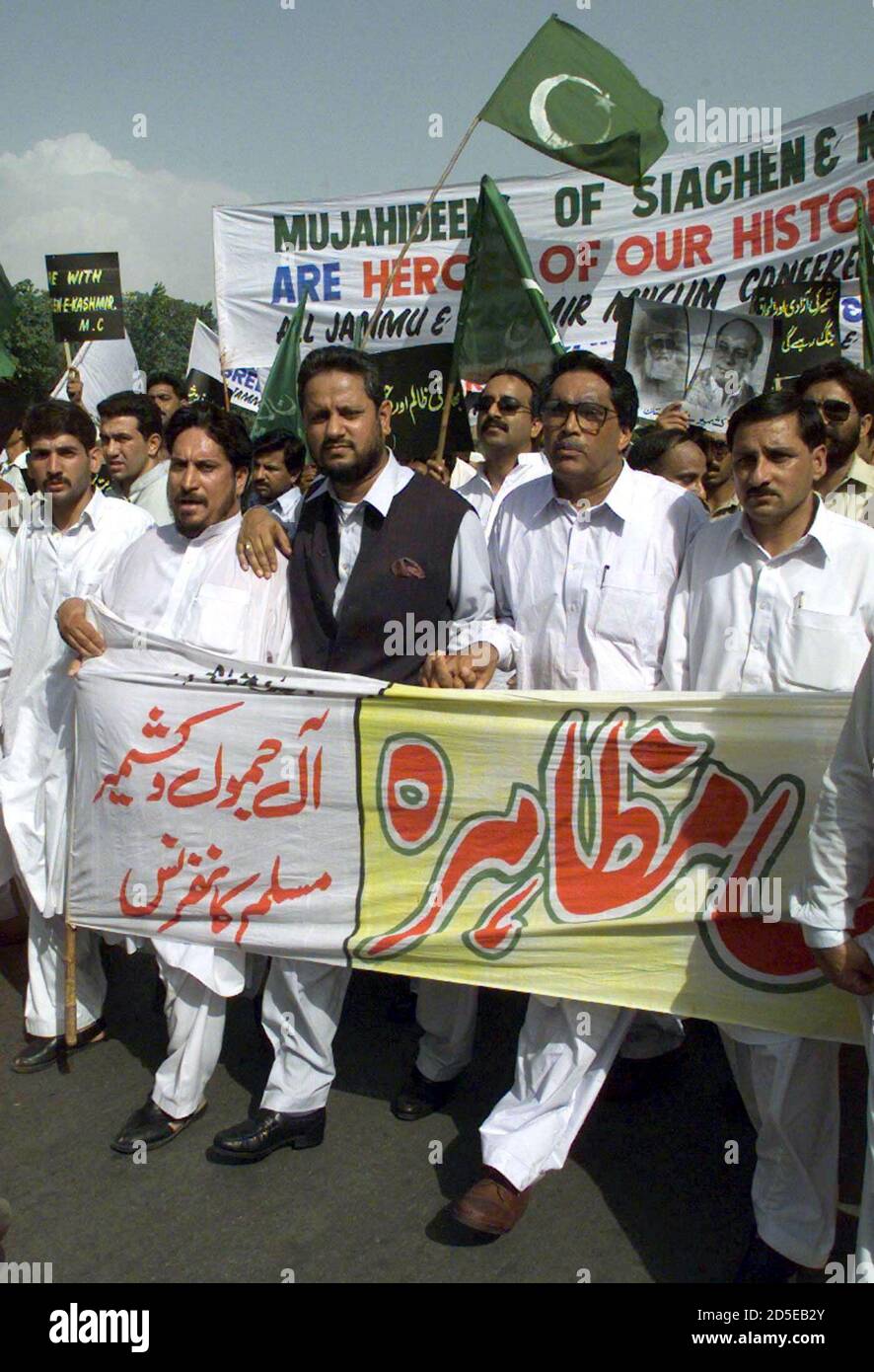 Sardar Atique (C) of the Muslim Conference party leads a march of Kashmiris towards the Indian High Commission in Islamabad June 11 to protest against shelling by Indian troops at the U.N. monitored ceasefire line in the disputed Kashmir state. Some 300 Kashmiris took part in the march.  CC Stock Photo