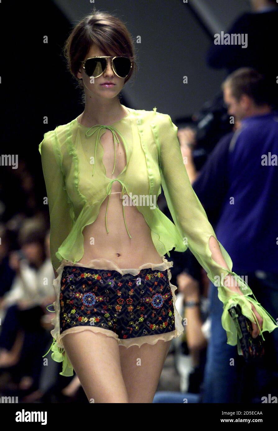 model displays a semi transparent shirt 