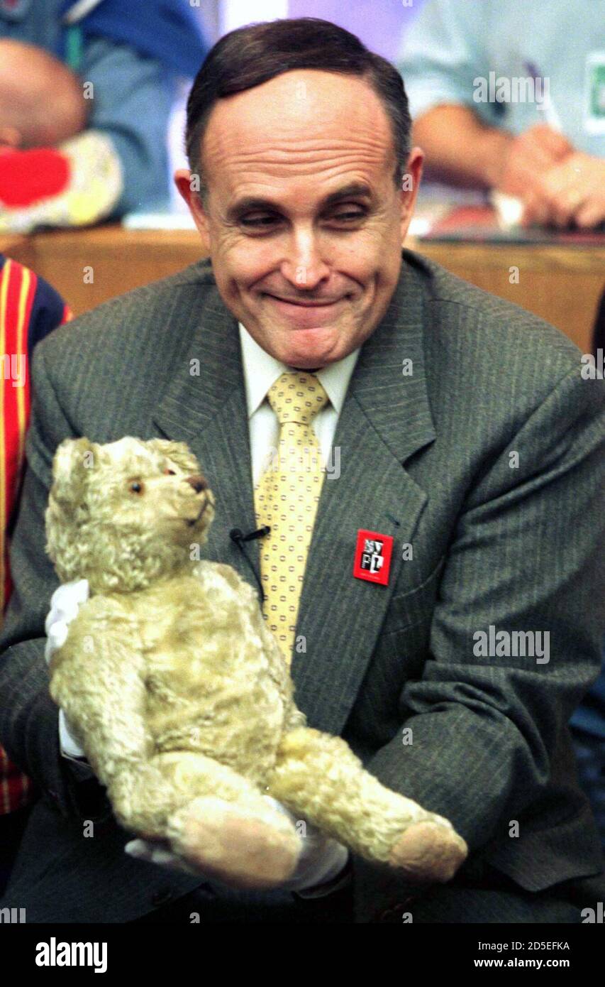 Mayor Rudolph Giuliani Holds The Original Winnie The Pooh Stuffed Bear During A Visit To A Branch Of The New York Public Library In New York February 5 Though British Government Officials