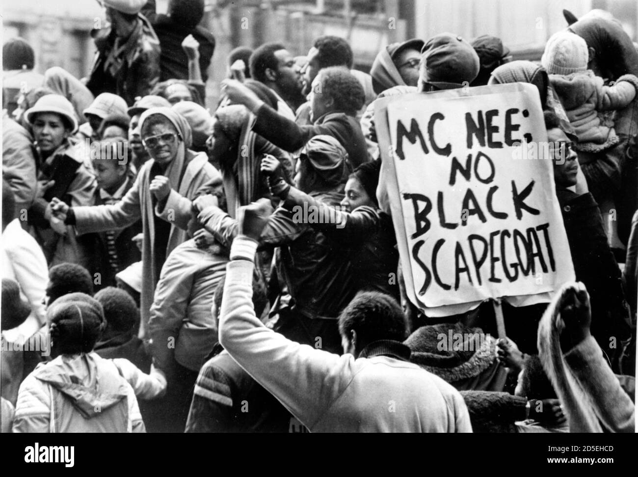 On Black People's Day of Action in 1981, thousands of people marched to Downing Street, peacefully in demonstration to protest against the Metropolitan Police's handling of the investigation of the New Cross Fire in which 13 black people people died. McNee is the then Met Police Commissioner, David McNee, who presided over some of the worst racial tension between the black community and the police. Stock Photo