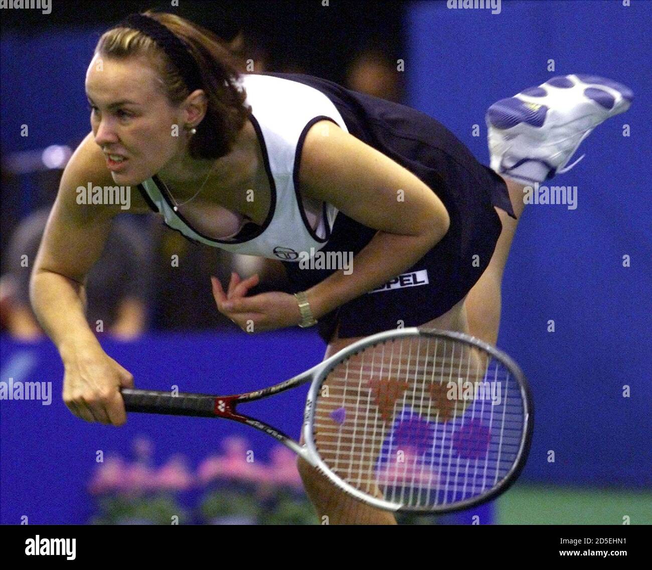 Australian Open champion Martina Hingis of Switzerland serves against Jana  Novotna of the Czech Republic in the semifinals of the US$1 million Pan  Pacific Open tennis tournament in Tokyo February 6. Hingis