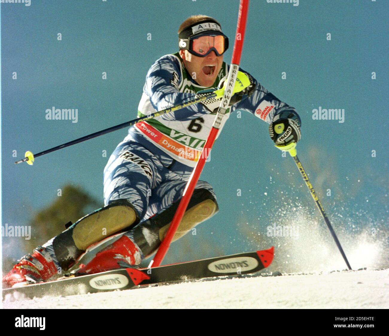 skier Sebastien Amiez knocks down a gate while on his way to posting the 11th fastest time during the first run on the men's slalom course at the World Alpine Skiing