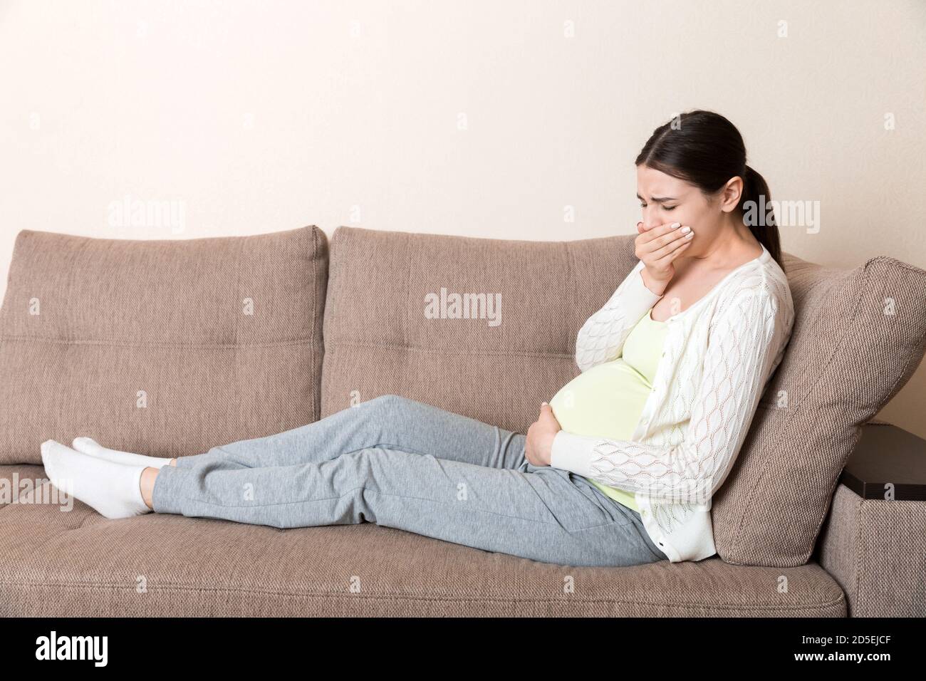 Pregnancy Morning Sickness. Pregnant Woman Having Nausea Feeling Bad in