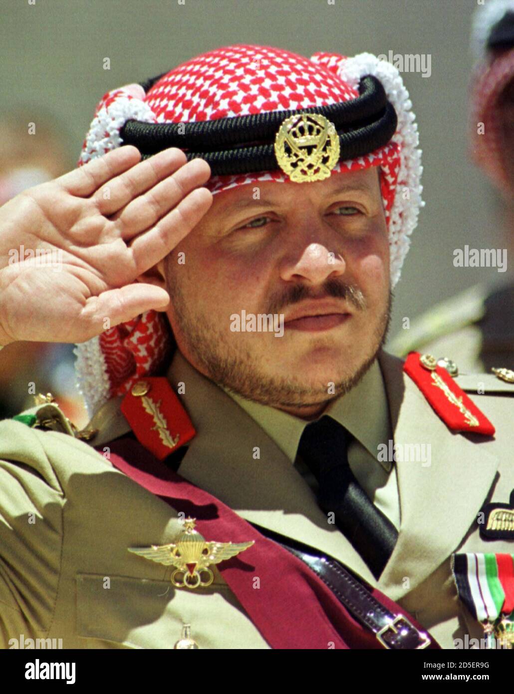 King Abdullah reviews a bedouin guard 