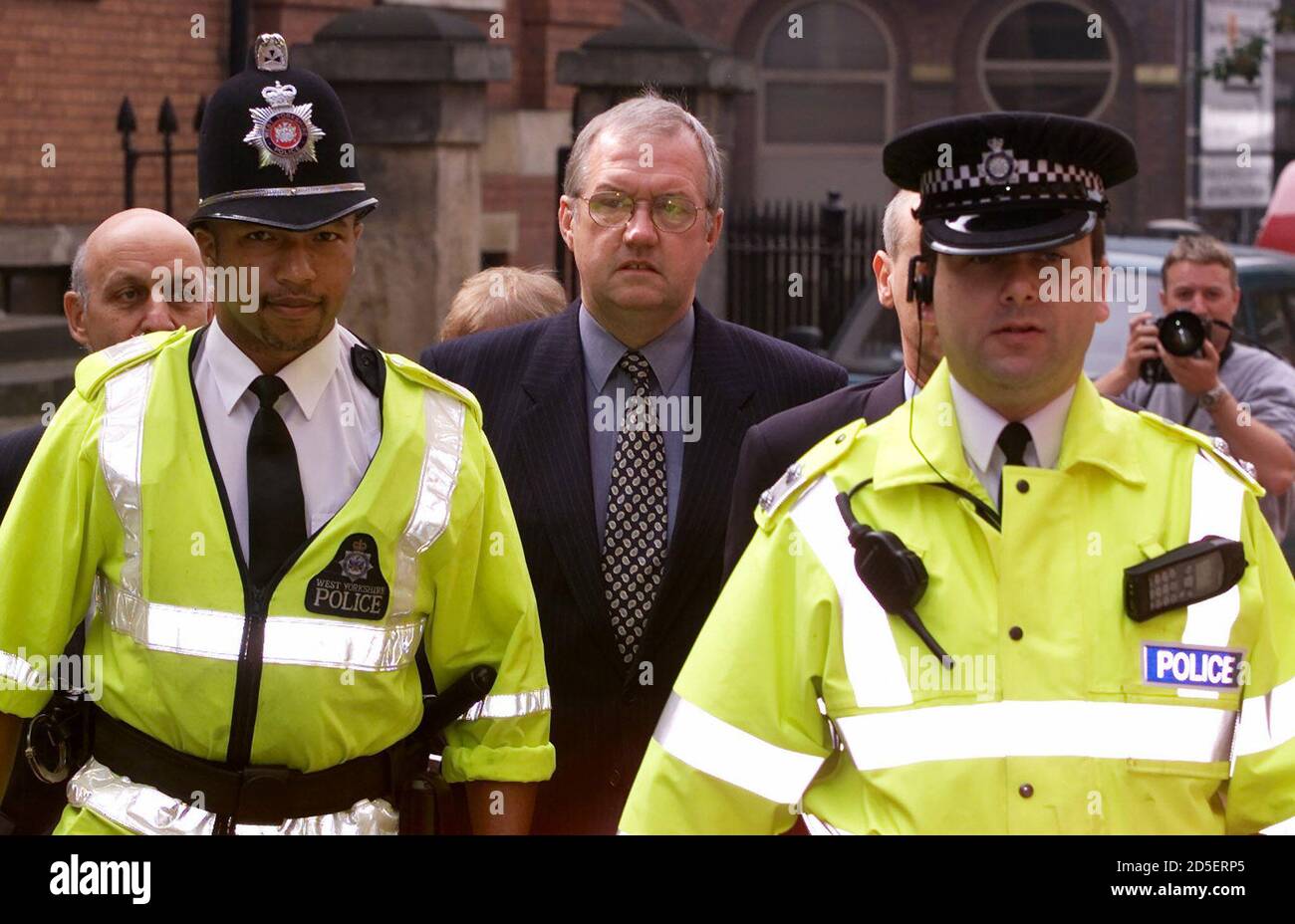 Former South Yorkshire Police Chief Superintendent David Duckinfield arrives at Leeds Crown Court under police escort to hear the judges deliberations after the jury failed to reach a verdict in the case brought by relatives of the victims of the Hillsborough disaster July 26. Duckinfield was charged with manslaughter and wilful neglect of duty in the first criminal proceedings to follow the Hillsborough tragedy in which 96 Liverpool soccer fans were crushed to death at the 1989 FA Cup Semi final. Former South Yorkshire Police Superintendent Bernard Murray who was also accused was acquitted of Stock Photo