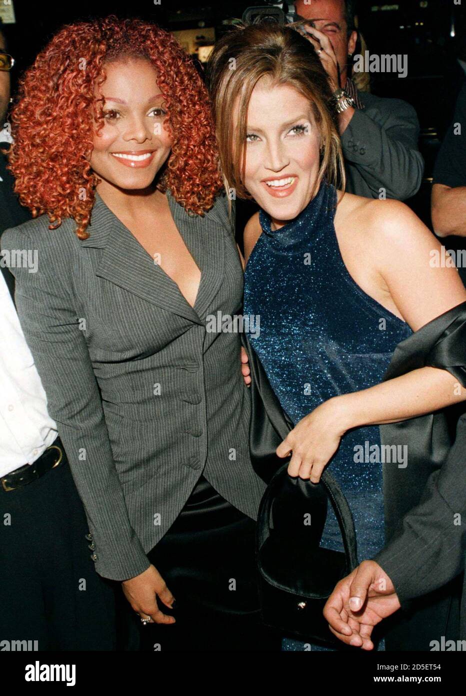 Singer Janet Jackson (L) and Lisa Marie Presley arrive at a record release  party September 3 in New York. Jackson's new album, "The Velvet Rope," will  be released worldwide October 7 Stock