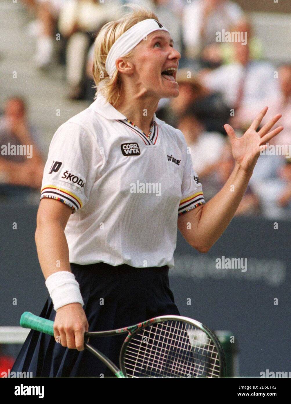 Jana Novotna of the Czech Republic screams after missing a point in the  final game against defending U.S. Open champion Martina Hingis of  Switzerland, during semi-final U.S. Open play at the USTA