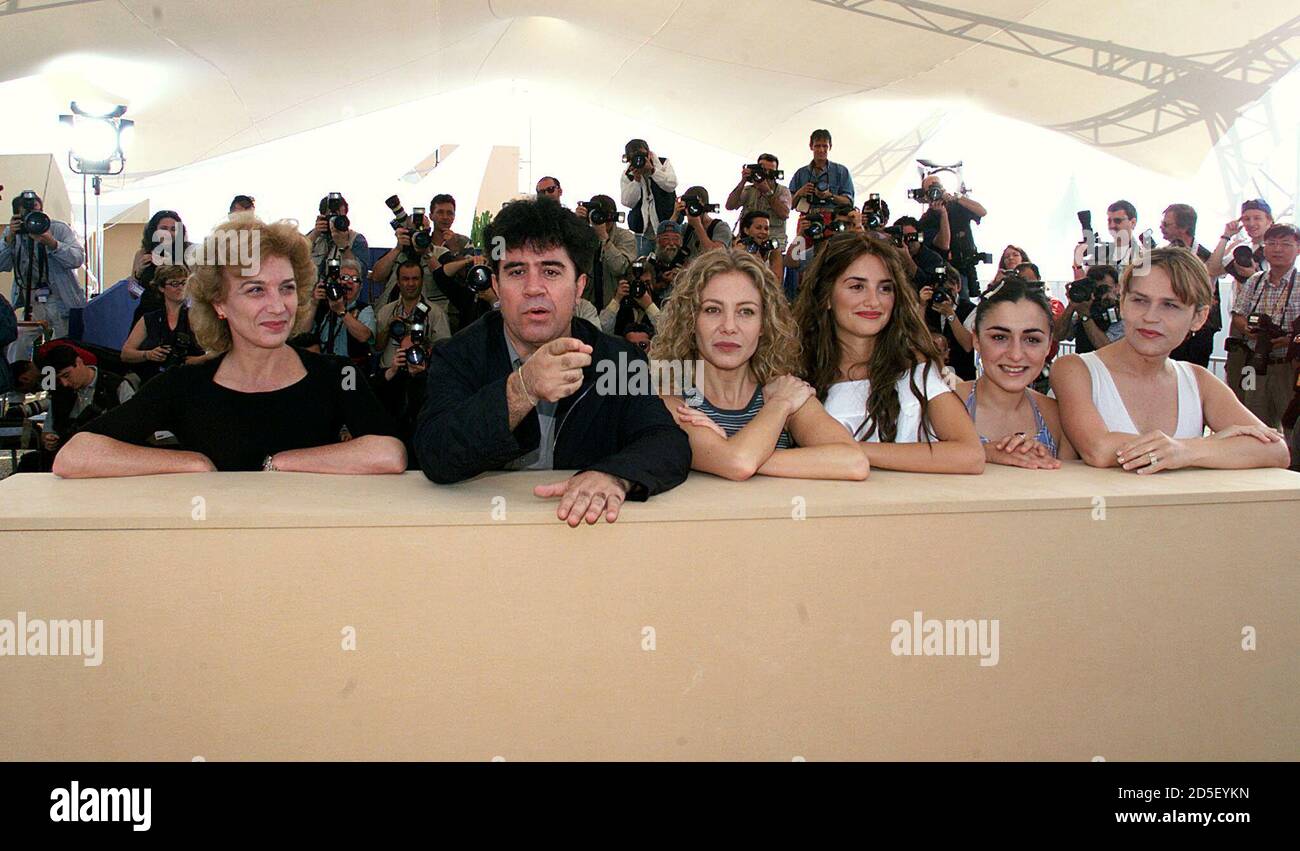 Spanish director Pedro Almodovar (2nd L) poses with his actresses (from L to R) Marisa Parades, Cecilia Roth, Penelope Cruz, Candella Pena and Antonia San Juan  during a photocall for their film 'Todo Sobre Mi Madre'  May 15. The film will be screened in competition  at the 52nd Cannes Film Festival.        ??» Stock Photo